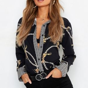 A polyester & elastane blouse